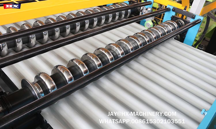 The 1064 corrugated iron roofing sheet making machine is designed for high-speed, precise production of durable corrugated iron roofing sheets. It minimizes material waste while ensuring consistent quality. The machine&rsquo;s advanced automated system reduces manual labor, increases production efficiency, and provides long-lasting performance. It offers cost-effective solutions for large-scale roofing projects and industrial applications, with easy operation and low maintenance needs, making it perfect for high-volume production.